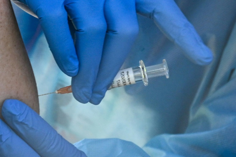L'Organisation mondiale de la santé (OMS) a réaffirmé vendredi qu'il n'existait aucune donnée qui montre une nocivité du thiomersal, un composant de certains vaccins et que des experts américains veulent supprimer ( AFP / Robyn Beck )