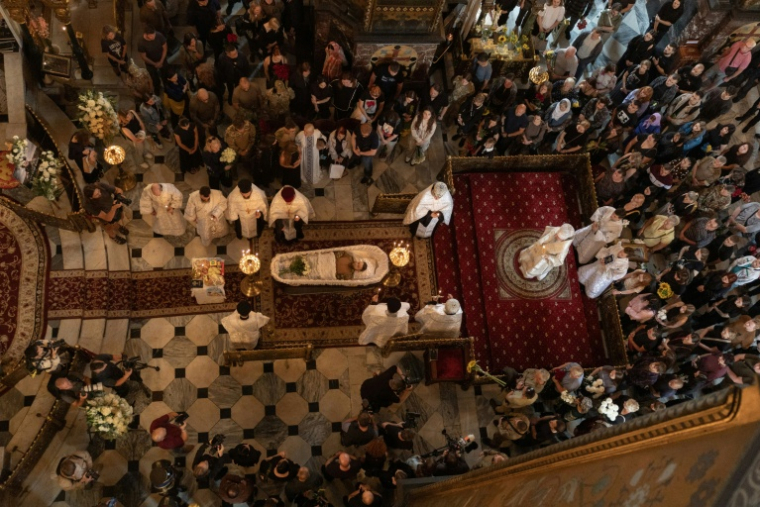Cérémonie funéraire en hommage à Oleksiï Ioukov, ancien chef de l’unité de recherche ukrainienne Platsdarm, à Kiev, le 8 août 2026 ( AFP / Roman PILIPEY )