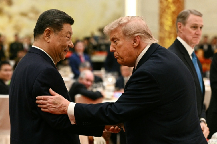 Le président chinois Xi Jinping et son homologue américain Donald Trump le 14 mai 2026 au Palais du peuple à Pékin. ( AFP / Brendan SMIALOWSKI )