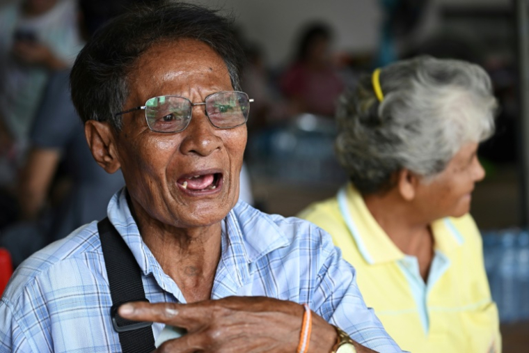 Samlee Sornchai, un agriculteur qui a fui la guerre des deux côtés de la frontière entre la Thaïlande et le Cambodge, lors d'un entretien à l'AFP le 26 juillet 2025 à Kanthararom, dans le  nord-est de la Thaïlande ( AFP / Lillian SUWANRUMPHA )