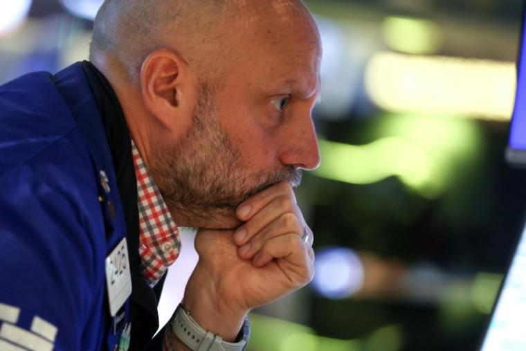 Un opérateur à la Bourse de New York le 14 mai 2026 ( AFP / TIMOTHY A. CLARY )