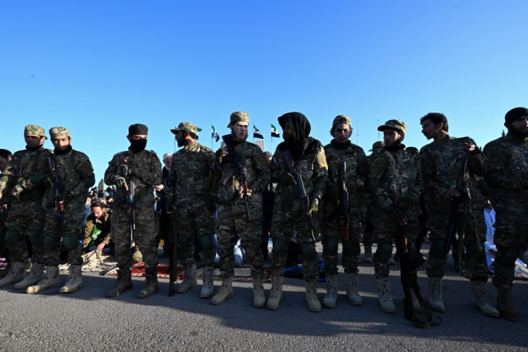 Des membres des forces gouvernementales syriennes à Damas, en Syrie, le 31 mars 2025. ( AFP / LOUAI BESHARA )