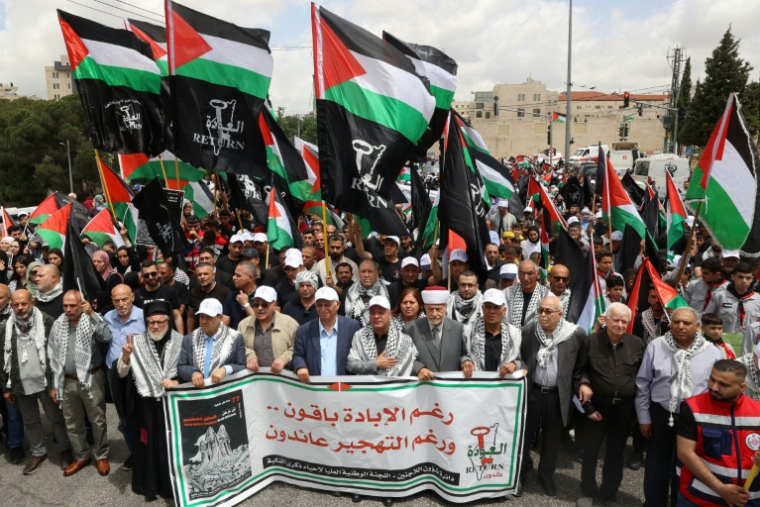 Des Palestiniens participent à un rassemblement pour commémorer le 77e anniversaire de la « Nakba » dans la ville de Ramallah en Cisjordanie occupée le 14 mai 2025 ( AFP / Zain JAAFAR )