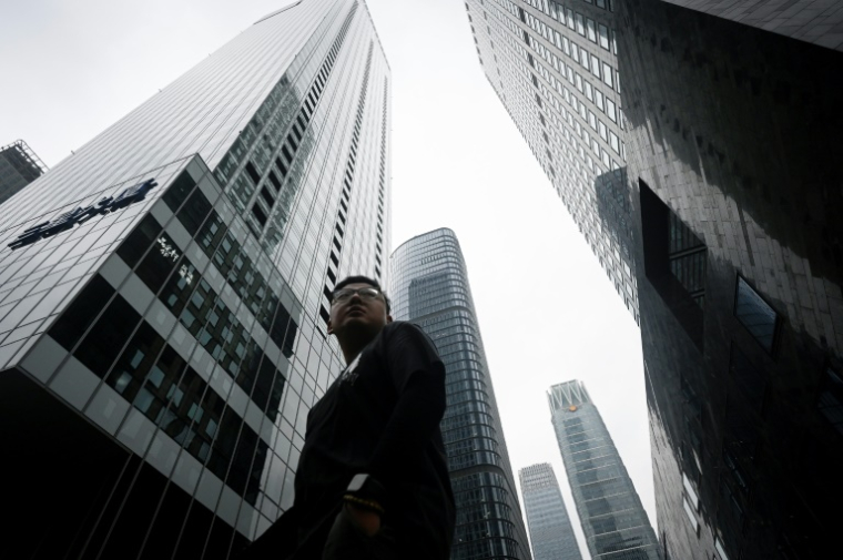Dans le quartier d'affaires de Pékin, le 15 juillet 2025 ( AFP / WANG Zhao )