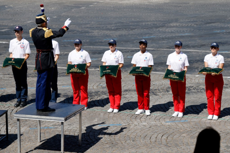 De jeunes engagés du SNU, à Paris, le 14 juillet 2023 ( AFP / LUDOVIC MARIN )