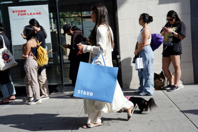 File d'attente devant une boutique pop-up dans le quartier de SoHo à New York