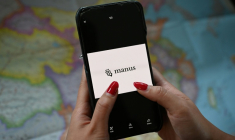 Logo Manus, sur un téléphone mobile, à Pékin le 28 avril 2026. ( AFP / GREG BAKER )