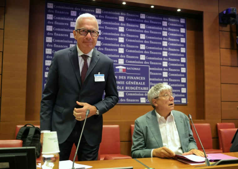 Le président d'ArcelorMittal France, Alain Le Grix de la Salle (G) lors de son audition devant la Commission des Finances de l'Assemblée nationale le 9 aout 2025 à Paris. ( AFP / Thomas SAMSON )