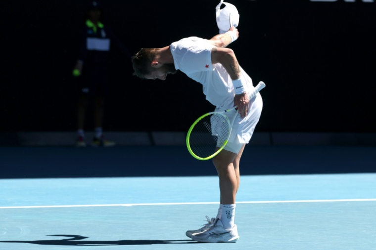 Le Français Corentin Moutet a été éliminé par Carlos Alcaraz au troisième tour de l'Open d'Australie le 23 janvier 2026 à Melbourne ( AFP / DAVID GRAY )