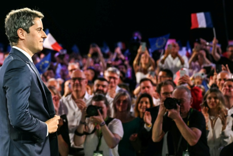 L'ex-Premier ministre et candidat de Renaissance à la présidentielle française, Gabriel Attal, lors de son premier meeting de campagne à Paris, le 30 mai 2026 ( AFP / LOU BENOIST )