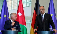Le chancelier allemand Friedrich Merz (à droite), en conférence de presse à Berlin avec le Roi Abdallah II de Jordanie, le 29 juillet 2025 ( AFP / John MACDOUGALL )