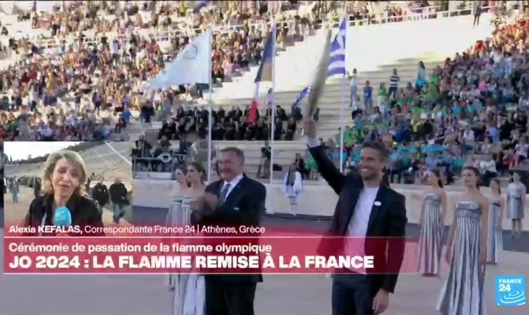 Cérémonie de passation de la flamme olympique