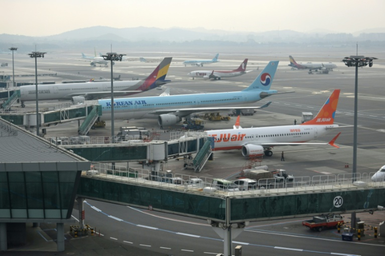 Des avions sur le tarmac de l'aéroport de Séoul, le 13 novembre 2025, en Corée du Sud ( AFP / Jung Yeon-je )