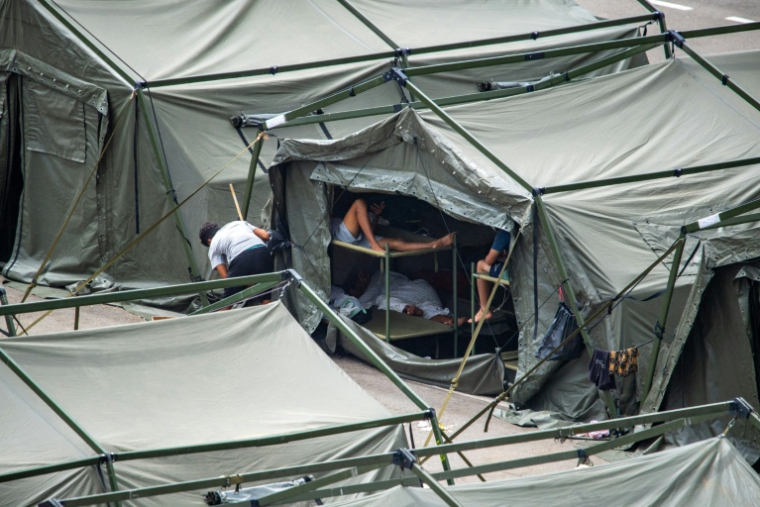Des abris temporaires pour migrants installés à Ceuta, le 27 août 2026  ( AFP / Antonio Sempere )