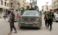 Membres des forces de sécurité syriennes à Sahnaya, près de Damas, le 1er mai 2025 ( AFP / OMAR HAJ KADOUR )