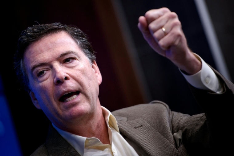 L'ancien directeur du FBI, la police fédérale américaine, James Comey, en promotion de son livre "A Higher Loyalty" à la Brookings Institution à Washington DC, le 11 mai 2018 ( AFP / Brendan Smialowski )