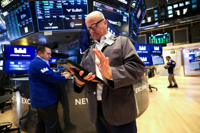 Un opérateur à la Bourse de New York, le 13 octobre 2025 ( AFP / TIMOTHY A. CLARY )