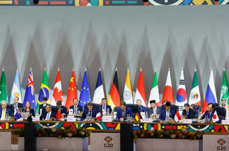 Vue d'ensemble de chefs d'Etat au début d'un sommet des dirigeants du G20 au centre d'expositions Nasrec de Johannesburg (Afrique du Sud), le 22 novembre 2025 ( POOL / Thomas Mukoya )