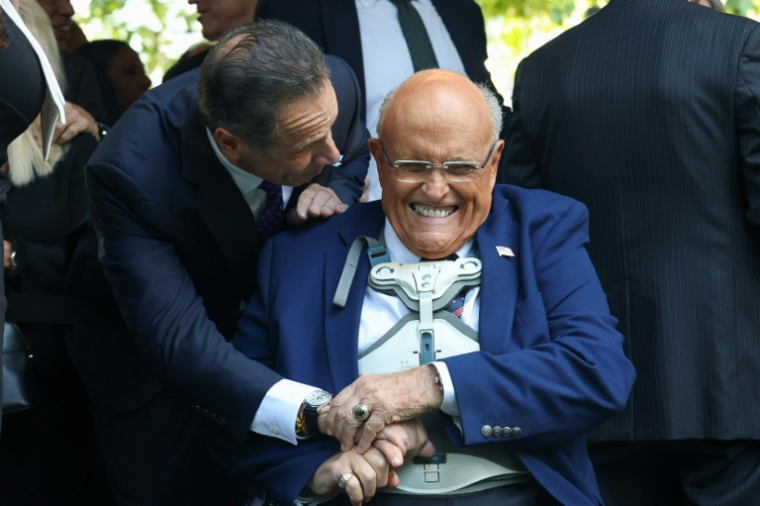 L'ancien maire de New York, Rudy Giuliani (C), assiste aux commémorations des attentats du 11-Septembre, le 11 septembre 2025 à New York ( AFP / TIMOTHY A.CLARY )