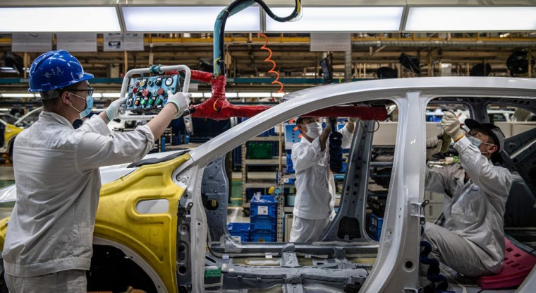 Les mesures de confinement commencent à s'alléger en Chine, où les autorités veulent montrer que le pays se remet en ordre de marche. (© AFP)
