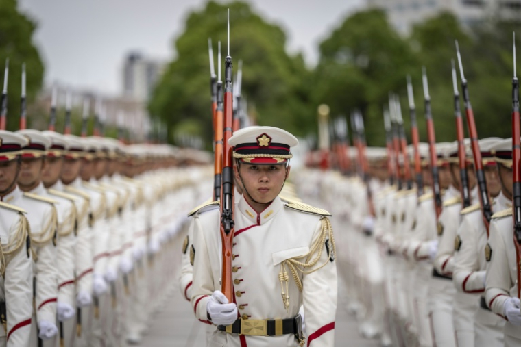 Members of an honour guard at Japan's  Ministry of Defence in Tokyo in June ( AFP / Yuichi YAMAZAKI )