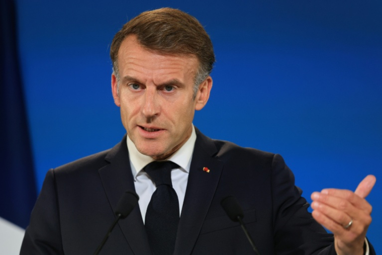 Le président Emmanuel Macron à Bruxelles le 16 octobre 2026 ( AFP / Ludovic MARIN )