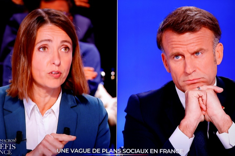 "On ressort de cet échange sans aucune annonce, pour améliorer" les salaires, les conditions de travail, les retraites ou les indemnités des "travailleurs et travailleuses", a déploré Sophie Binet, numéro un de la CGT qui était confrontée à Emmanuel Macron lors de ce débat sur TF1. ( AFP / Ludovic MARIN )