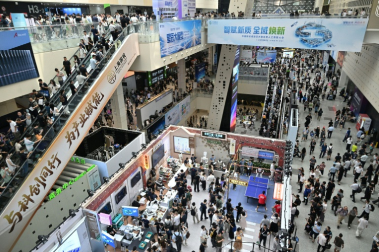 A la Conférence mondiale sur l'intelligence artificielle (WAIC) de Shanghai, le 18 juillet 2026 ( AFP / Hector RETAMAL )