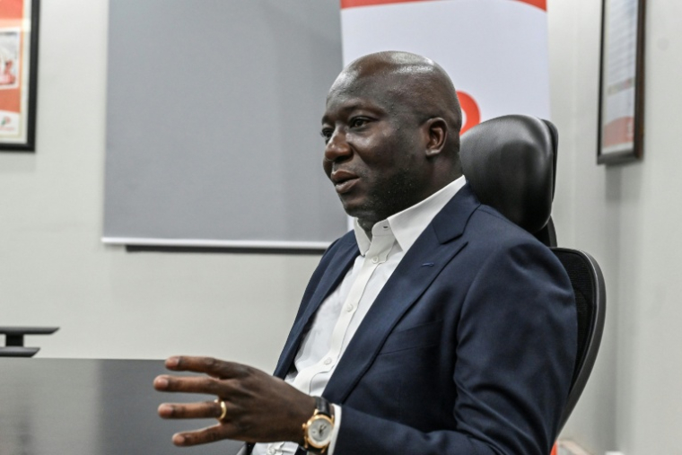 Sébastien Kadio Morokro, directeur général de l'entreprise Petro Ivoire, lors d'un entretien dans son bureau à Abidjan, le 7 juillet 2026 en Côte d'Ivoire ( AFP / Issouf SANOGO )