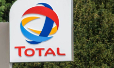 Le logo Total sur une des stations service du groupe. (© D. Charlet / AFP)