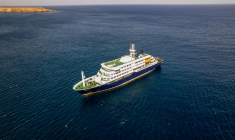 Vue aérienne du bateau de croisière MV Hondius au mouillage au large du port de Praia, au Cap-Vert, le 3 mai 2026 ( AFP / - )
