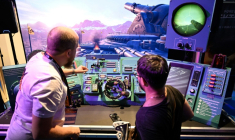 Des participants jouent au jeu vidéo PVKK de l'éditeur Keppler Interactive lors du salon des jeux vidéo Gamescom à Cologne, le 20 août 2025 en Allemagne ( AFP / INA FASSBENDER )
