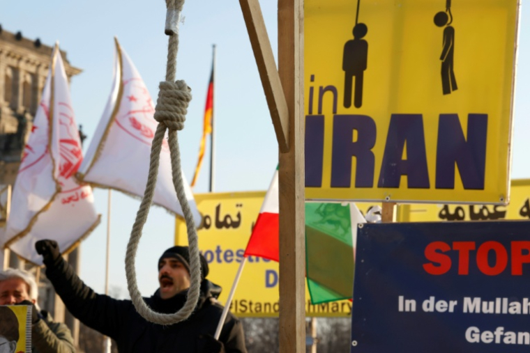 Manifestation d'exilés iraniens à Berlin, en soutien aux opposants au gouvernement de Téhéran, le 19 janvier 2023 ( AFP / Odd ANDERSEN )