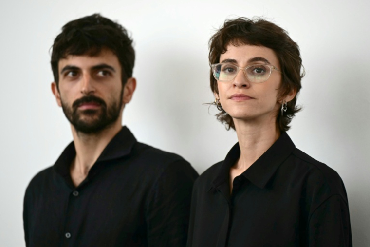 La journaliste et réalisatrice Rachel Szor et le journaliste et cinéaste israélien Yuval Abraham assistent au photocall de « Naza », présenté en compétition à la 83e Mostra internationale de Venise, le 10 septembre 2026. ( AFP / Stefano Rellandini )