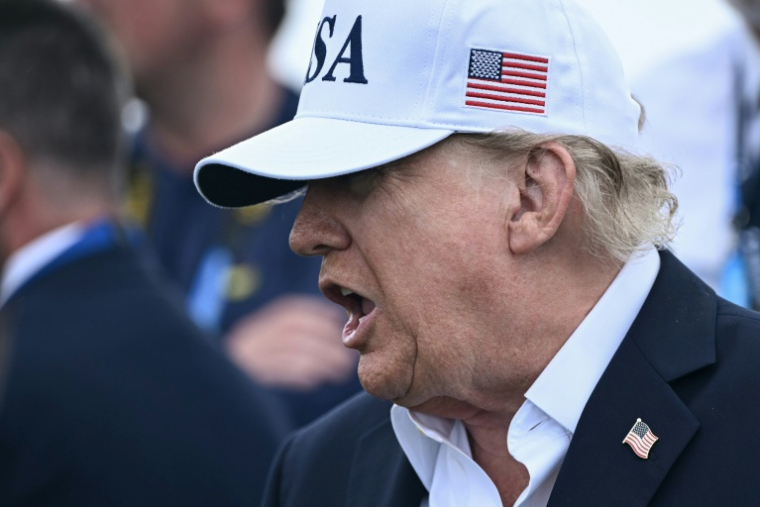 Le président américain Donald Trump assiste au tournoi de golf Irish Open organisé sur son parcours, à Doonbeg, en Irlande, le 13 septembre 2026 ( AFP / Brendan SMIALOWSKI )