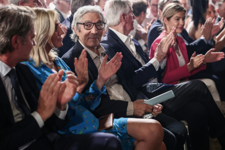 L'écrivain franco-algérien Boualem Sansal (c) lors du meeting de Bruno Retailleau, président de LR et candidat à la présidentielle, au Parc Floral de Paris, le 20 juin 2026 ( AFP / Guillaume BAPTISTE )