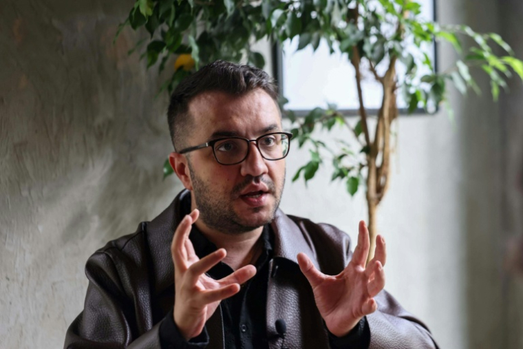 Yildiz Tar, membre de l'organisation turque Kaos GL qui défend les droits des homosexuels et transgenres, le 18 septembre 2026 à Ankara ( AFP / Adem ALTAN )