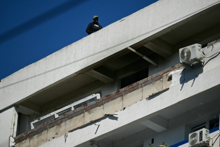 Un appartement endommagé après le crash d'un drone russe à Galati, en Roumanie, le 29 mai 2026 ( AFP / Daniel MIHAILESCU )