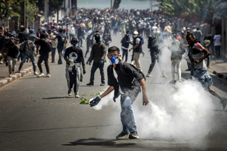 Affrontements entre manifestants et forces de sécurité à Antananarivo, le 11 octobre 2025 à Madagascar ( AFP / Luis TATO )