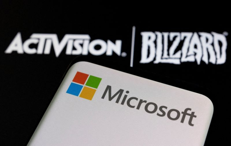 Illustration des logos de Microsoft et d'Activision Blizzard