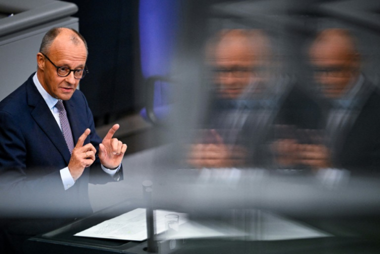 Le chancelier allemand Friedrich Merz au Bundestag, la chambre basse du parlement allemand, le 24 septembre 2025 à Berlin ( AFP / Tobias SCHWARZ )