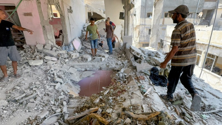 Site d'une frappe israélienne sur une maison dans la ville de Gaza