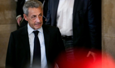 L'ancien président Nicolas Sarkozy quitte la salle d'audience du Palais de Justice après que le parquet a requis une peine de sept ans de prison à son encontre lors de son procès en appel dans le financement libyen, le 13 mai 2026 à Paris ( AFP / Dimitar DILKOFF )