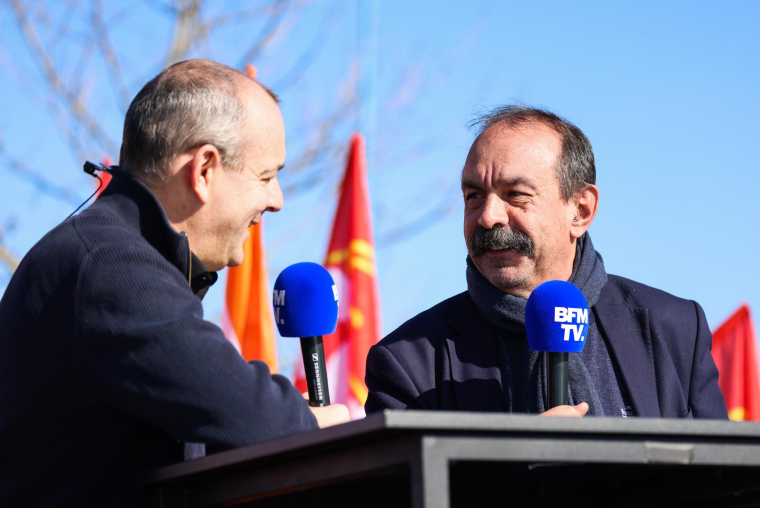 Laurent Berger et Philippe Martinez, à Albi, le 16 février 2023 ( AFP / CHARLY TRIBALLEAU )