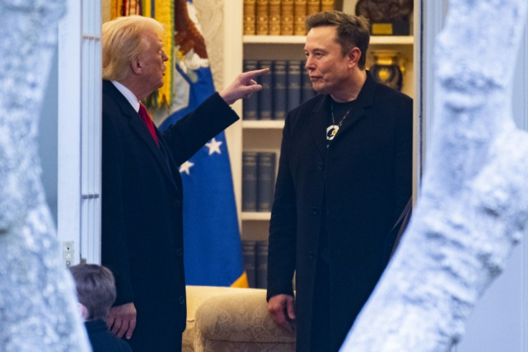 Donald Trump et Elon Musk (à droite) à la Maison Blanche, le 14 mars 2025 ( AFP / ROBERTO SCHMIDT )