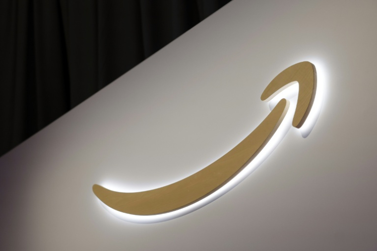 Le logo d'Amazon sur un stand au CES de Las Vegas, Etats-Unis, le 6 janvier 2026 ( AFP / Caroline Brehman )