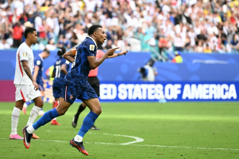 Le capitaine français Kylian Mbappe après avoir marqué le 3e but tricolore lors de la petite finale de la Coupe du monde entre la France et l'Angleterre à Miami le 18 juillet 2026 ( AFP / CHANDAN KHANNA )