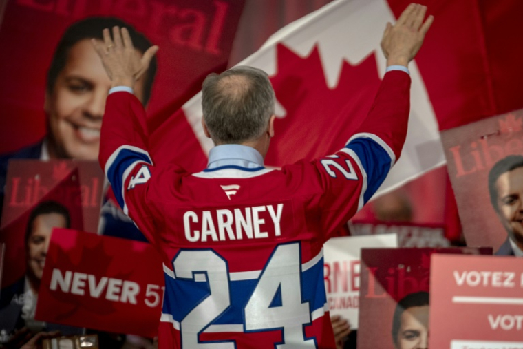 Le Premier ministre canadien et candidat libéral Mark Carney lors d'un meeting au Québec, le 22 avril 2025. ( AFP / ANDREJ IVANOV )