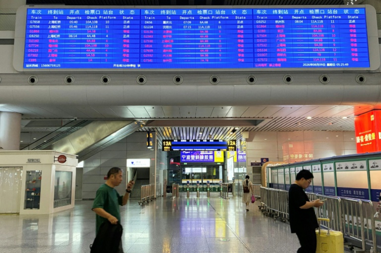 Airports in China cancelled flights and some train services had been affected as China's eastern coast prepared for Typhoon Dolphin ( AFP / Rebecca BAILEY )