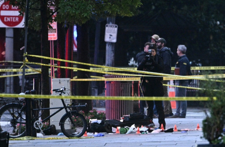 La police scientifique sur les lieux des tirs près de la Maison Blanche à Washington, le 23 mai 2026 ( AFP / Brendan SMIALOWSKI )
